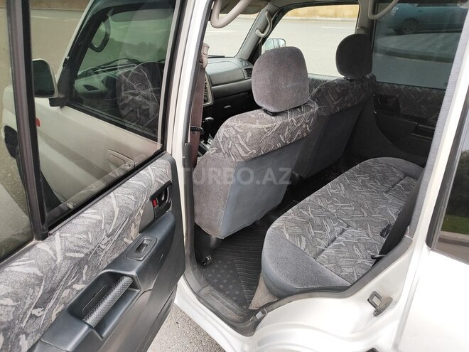 Mitsubishi Pajero io 1999, 262,167 km - 1.8 l - Bakı
