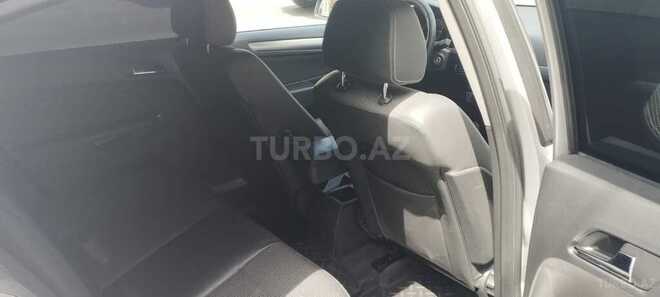 Opel Astra 2012, 233,000 km - 1.8 л - Bakı