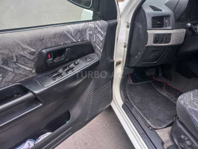 Mitsubishi Pajero io 1999, 426,561 km - 1.8 л - Sumqayıt