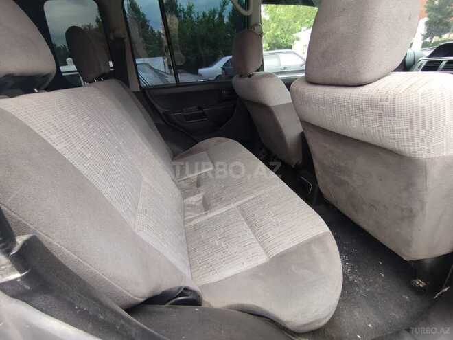 Mitsubishi Pajero io 2003, 180,000 km - 2.0 л - Ağcabədi