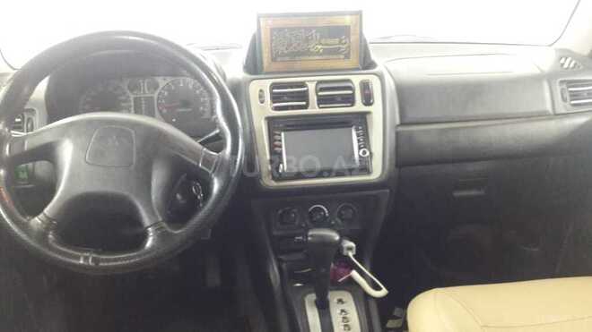 Mitsubishi Pajero io 1999, 129,800 km - 1.8 l - Bakı