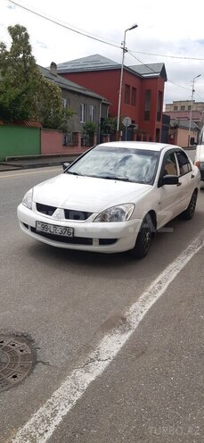 Mitsubishi Lancer 2008, 311,700 km - 1.3 l - Qusar