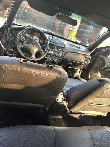 Nissan Sunny 2006, 450,000 km - 1.6 l - Bakı