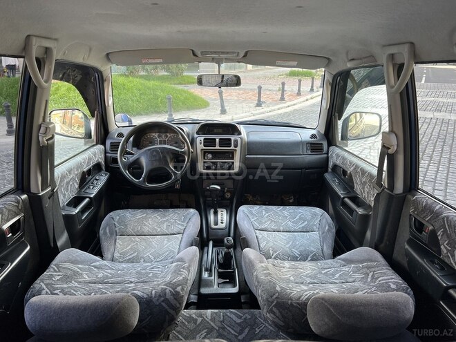 Mitsubishi Pajero io 1999, 307,000 km - 1.8 l - Bakı