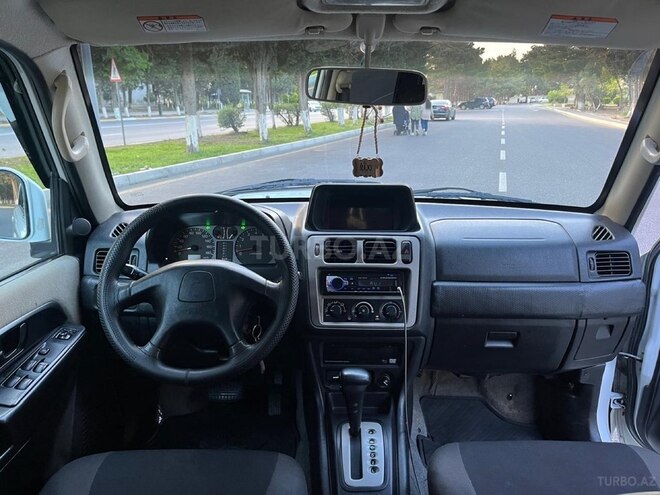 Mitsubishi Pajero io 2002, 276,543 km - 2.0 l - Bakı