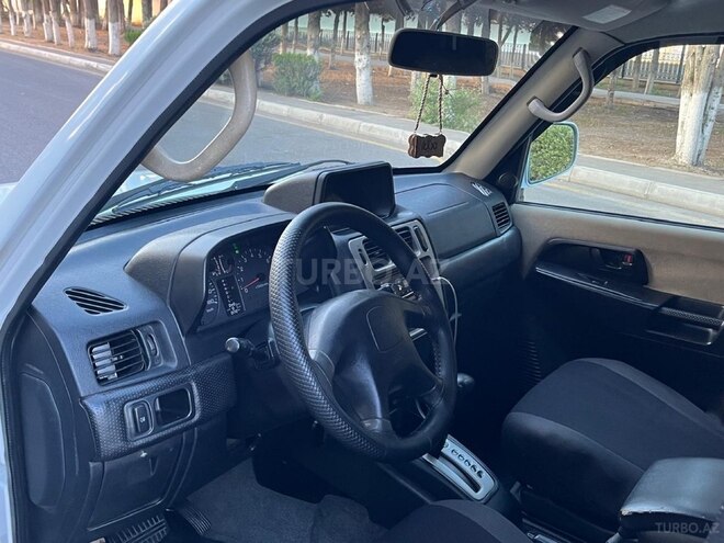 Mitsubishi Pajero io 2002, 276,543 km - 2.0 l - Bakı