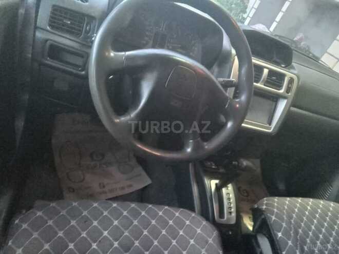 Mitsubishi Pajero io 2002, 250,000 km - 2.0 l - Bakı