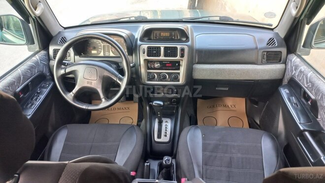 Mitsubishi Pajero io 1999, 240,000 km - 2.0 l - Bakı