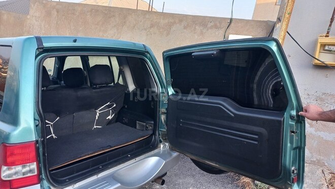 Mitsubishi Pajero io 1999, 240,000 km - 2.0 l - Bakı