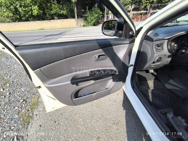 Kia Rio 2010, 325,000 km - 1.4 l - Qax