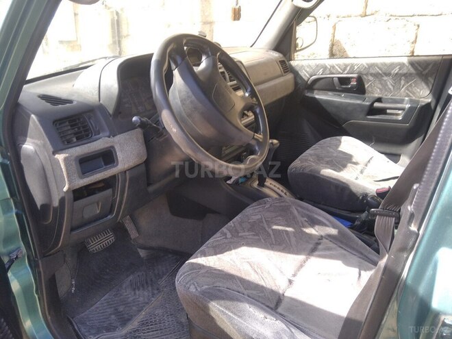 Mitsubishi Pajero io 1999, 450,000 km - 1.8 л - Bakı