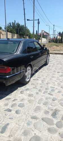 Mercedes E 240 1998, 266,545 km - 2.4 l - Bakı