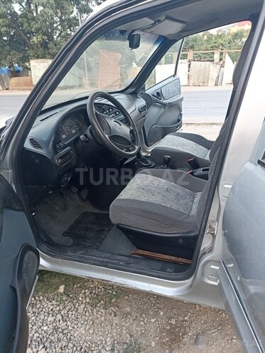 Chevrolet Niva 2003, 546,377 km - 1.7 l - Quba