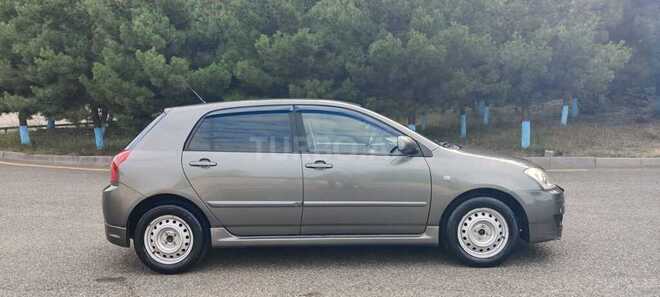 Toyota Corolla 2005, 253,000 km - 1.4 l - Qusar