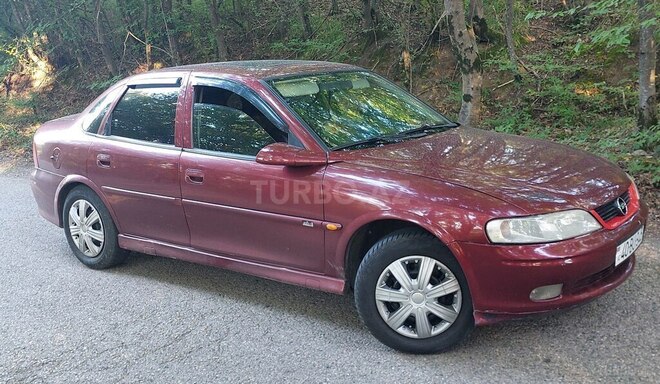 Opel Vectra 1999, 310,200 km - 2.5 l - Quba