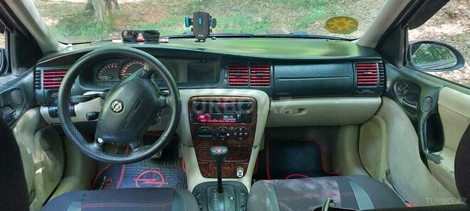 Opel Vectra 1999, 310,200 km - 2.5 l - Quba