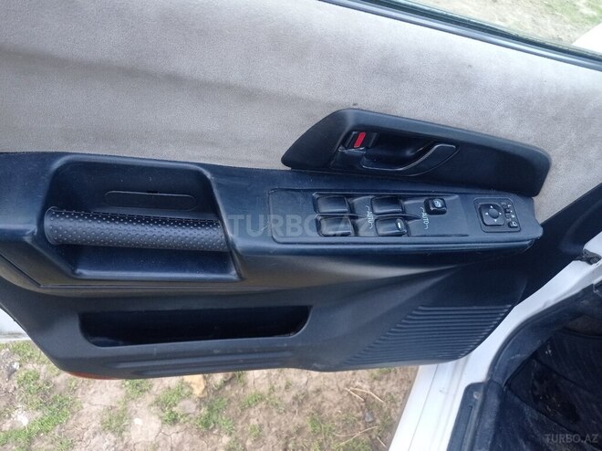 Mitsubishi Pajero io 2001, 134,000 km - 2.0 l - Yardımlı