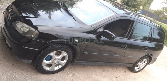 Opel Astra 2003, 320,965 km - 2.2 l - Quba