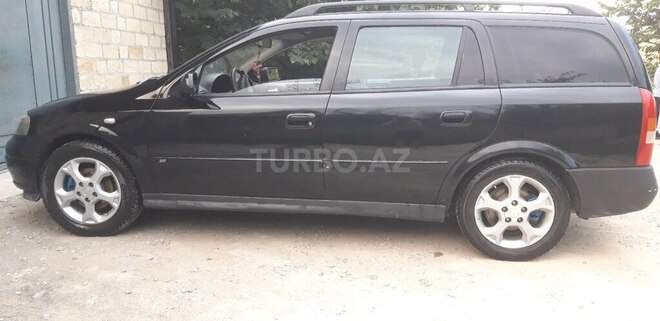 Opel Astra 2003, 320,965 km - 2.2 l - Quba