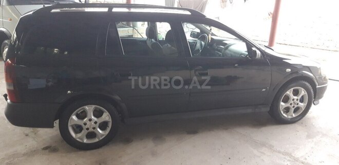 Opel Astra 2003, 320,965 km - 2.2 l - Quba