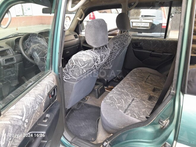 Mitsubishi Pajero io 1998, 420,000 km - 1.8 л - Bakı