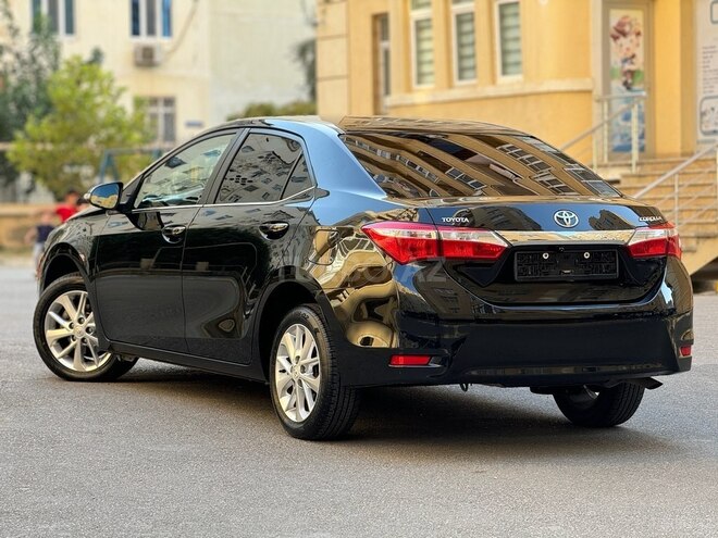Toyota Corolla 2014, 215,000 km - 1.6 l - Bakı