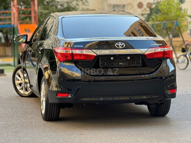 Toyota Corolla 2014, 215,000 km - 1.6 l - Bakı