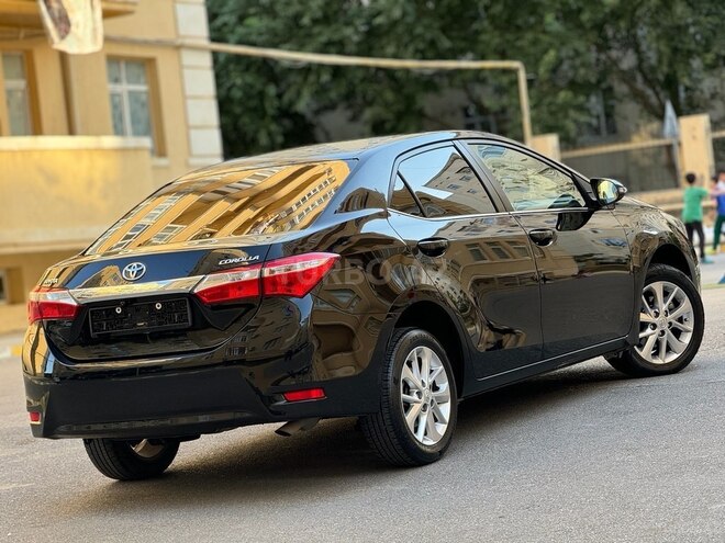 Toyota Corolla 2014, 215,000 km - 1.6 l - Bakı