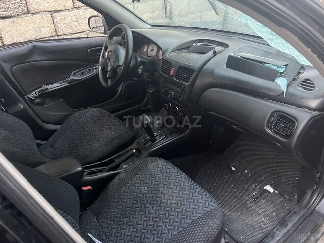 Nissan Sunny 2010, 220,456 km - 1.6 л - Bakı