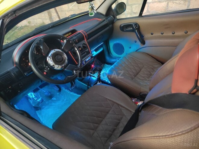 Opel Tigra 1997, 32,562 km - 1.4 l - Quba