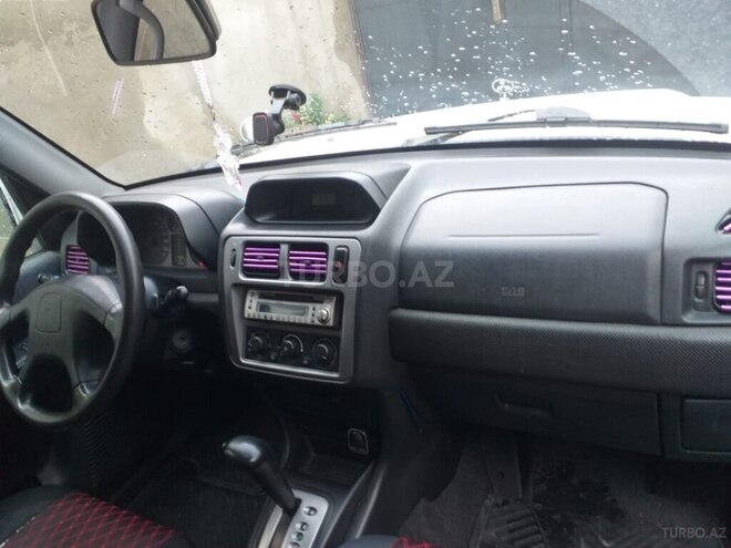Mitsubishi Pajero io 2002, 315,171 km - 2.0 l - Bakı