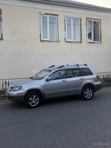 Mitsubishi Outlander 2004, 338,000 km - 2.4 л - Qusar