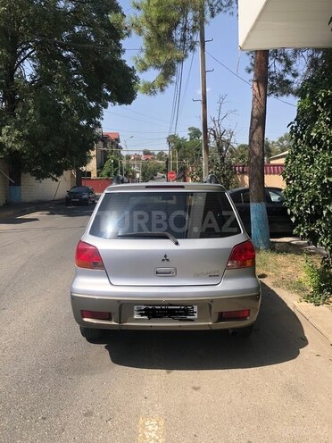 Mitsubishi Outlander 2004, 338,000 km - 2.4 л - Qusar