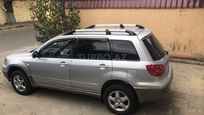 Mitsubishi Outlander 2004, 338,000 km - 2.4 л - Qusar