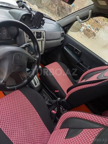 Mitsubishi Pajero io 1999, 464,000 km - 1.8 л - Bakı
