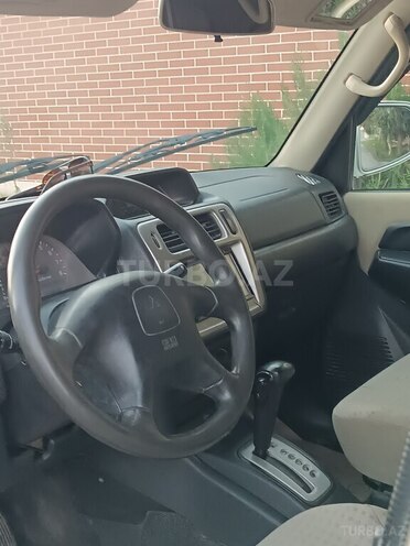 Mitsubishi Pajero io 2004, 390,000 km - 2.0 л - Quba