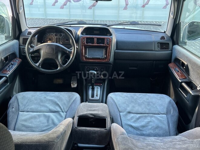 Mitsubishi Pajero io 2001, 256,000 km - 2.0 l - Bakı