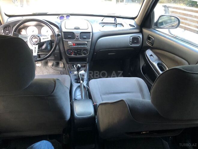 Nissan Sunny 2008, 278,000 km - 1.3 l - Bakı