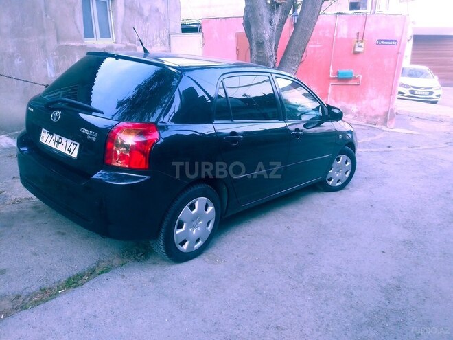 Toyota Corolla 2006, 244,000 km - 1.4 л - Bakı