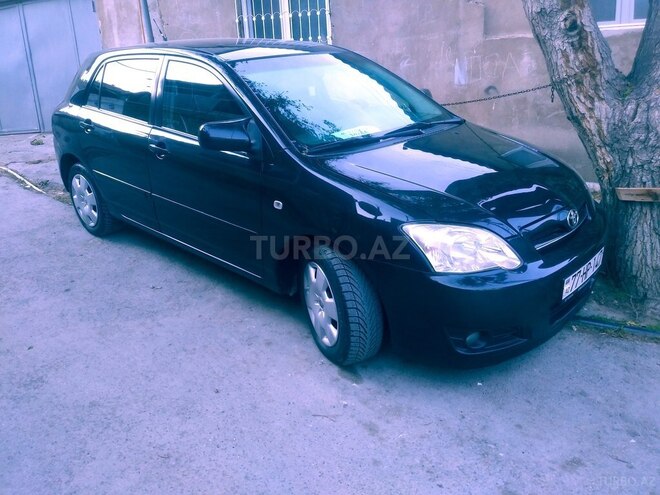 Toyota Corolla 2006, 244,000 km - 1.4 л - Bakı