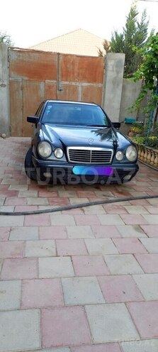 Mercedes E 230 1997, 304,236 km - 2.3 l - Bakı