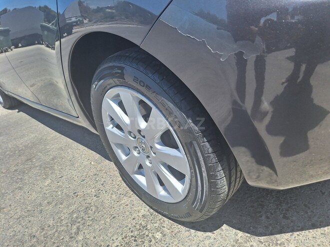 Toyota Auris 2009, 244,477 km - 1.4 л - Bakı