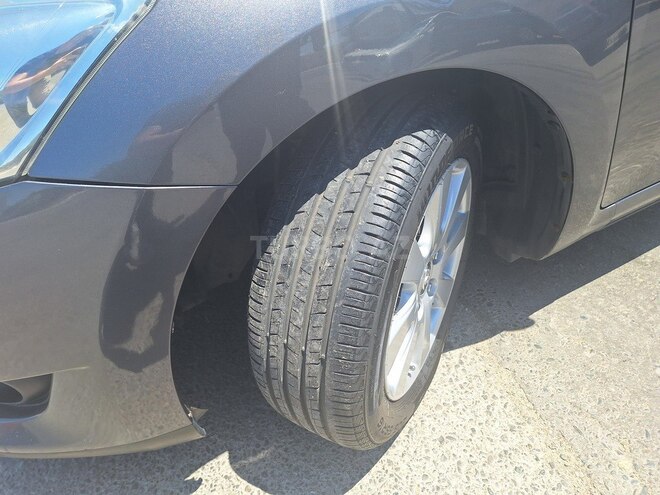 Toyota Auris 2009, 244,477 km - 1.4 л - Bakı