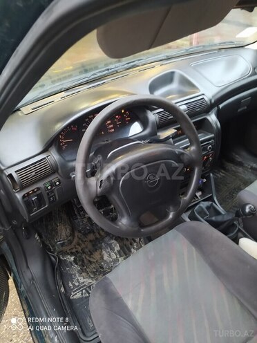Opel Astra 1997, 352,144 km - 1.4 л - Xudat