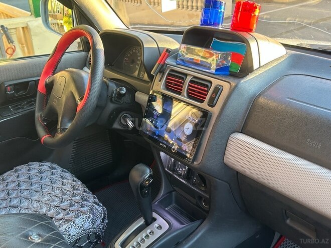 Mitsubishi Pajero io 1999, 380,000 km - 1.8 l - Bakı