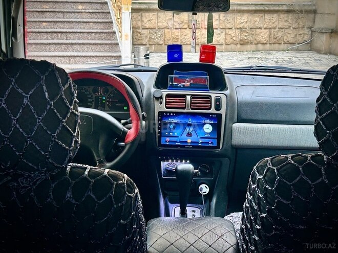 Mitsubishi Pajero io 1999, 380,000 km - 1.8 l - Bakı