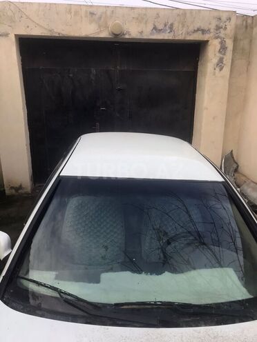 Nissan Sunny 2006, 200,000 km - 1.6 l - Bakı