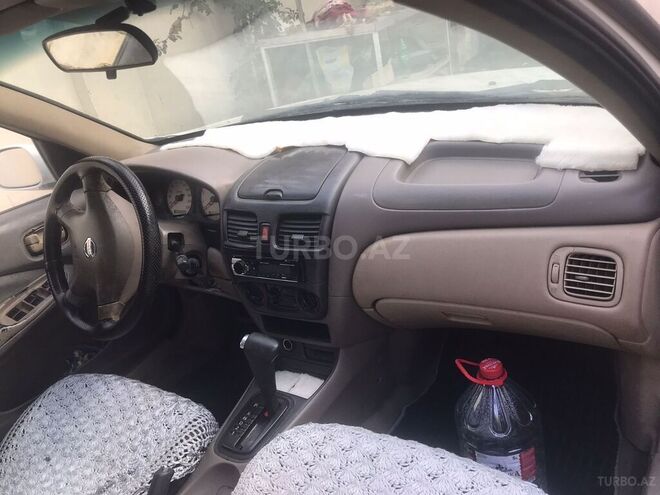Nissan Sunny 2006, 200,000 km - 1.6 l - Bakı