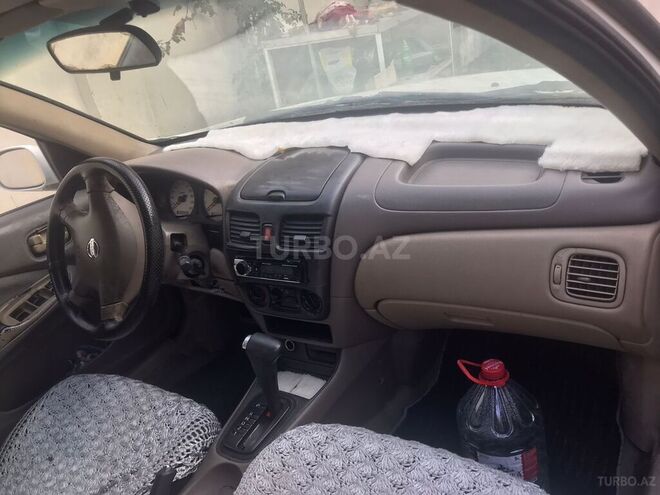 Nissan Sunny 2006, 200,000 km - 1.6 l - Bakı