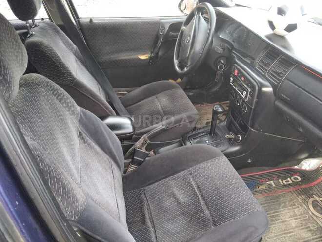 Opel Vectra 1996, 234,656 km - 2.0 l - Quba